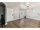 Bright and airy living room with hardwood floors and neutral walls at 3662 Mohawk Dr, Mount Dora, FL 32757