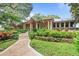 Front view of house showcasing landscaping and walkway to entrance at 451 Northwind Rd, Maitland, FL 32751