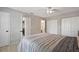 Bright bedroom with laundry access and view of a bathroom at 466 W Par St # 466, Orlando, FL 32804