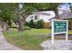 The Greens Condominiums sign, showcasing the community entrance at 466 W Par St # 466, Orlando, FL 32804