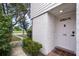 Home's entrance with walkway, landscaping and street view at 466 W Par St # 466, Orlando, FL 32804