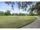 Landscaped golf course with a walking path and lush greenery at 466 W Par St # 466, Orlando, FL 32804