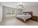 Spacious main bedroom with wood floor and ceiling fan at 466 W Par St # 466, Orlando, FL 32804