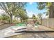 Backyard with play area and large shade tree at 4862 Indialantic Dr, Orlando, FL 32808