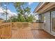 Deck with view of backyard and surrounding trees at 4862 Indialantic Dr, Orlando, FL 32808