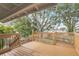 Spacious deck overlooking backyard with large tree at 4862 Indialantic Dr, Orlando, FL 32808