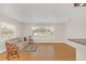 Living room with hardwood floors and large windows at 4862 Indialantic Dr, Orlando, FL 32808