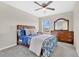 Bedroom with a full-size bed and dresser at 5302 Royal Point Ave, Kissimmee, FL 34746