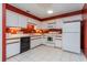 Efficient kitchen featuring white appliances and ample counter space at 596 Albany Pl, Longwood, FL 32779