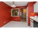 Adjacent kitchen with white appliances and tile flooring viewed from breakfast nook at 596 Albany Pl, Longwood, FL 32779