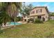 Spacious backyard with pool and patio area at 602 Iris St, Altamonte Springs, FL 32714