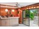 Home bar with sliding doors opening to a patio at 602 Iris St, Altamonte Springs, FL 32714