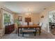 Dining room with a wooden table, chandelier, and built-in hutch at 602 Iris St, Altamonte Springs, FL 32714