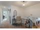 Upper hallway with a comfortable chair and views into other rooms at 602 Iris St, Altamonte Springs, FL 32714