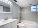 Updated bathroom with subway tile and a white vanity at 608 Powers Ave, Port Orange, FL 32127