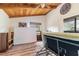 Bright bedroom featuring wood floors and a ceiling fan at 628 Twin Oaks Cir, Daytona Beach, FL 32117