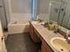 Double vanity bathroom with soaking tub at 800 Woodlark Dr, Davenport, FL 33897