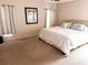 Spacious bedroom with king-size bed and neutral decor at 800 Woodlark Dr, Davenport, FL 33897