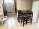 Small dining area with table and four chairs at 800 Woodlark Dr, Davenport, FL 33897