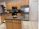 Kitchen with stainless steel appliances and island at 800 Woodlark Dr, Davenport, FL 33897