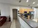 Kitchen boasts stainless steel appliances and an island at 800 Woodlark Dr, Davenport, FL 33897