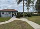 Community pool with a pool house and bike rack at 800 Woodlark Dr, Davenport, FL 33897