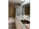 Clean bathroom with tub, granite vanity, and shower at 8421 S Orange Blossom Trl # 321, Orlando, FL 32809