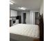 Studio with kitchenette, king bed, and ample closet space at 8421 S Orange Blossom Trl # 321, Orlando, FL 32809