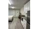Studio with kitchenette, king bed, and ample closet space at 8421 S Orange Blossom Trl # 321, Orlando, FL 32809