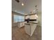 Modern kitchen with white cabinets and granite countertops at 8692 Wellington Blue Ln, Windermere, FL 34786