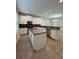 Island kitchen with stainless steel appliances at 8692 Wellington Blue Ln, Windermere, FL 34786