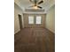 Main bedroom with high ceilings, ceiling fan, and carpet at 8692 Wellington Blue Ln, Windermere, FL 34786