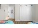 Twin bedroom with themed bedding and access to a full bathroom at 8925 Candy Palm Rd, Kissimmee, FL 34747