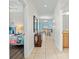 Hallway view of the home's bedrooms, living room and bathroom at 8925 Candy Palm Rd, Kissimmee, FL 34747