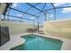 Private screened pool and patio furniture, lake view at 8925 Candy Palm Rd, Kissimmee, FL 34747