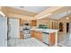 Kitchen with stainless steel appliances and wood cabinets at 905 Hatteras Ave, Minneola, FL 34715