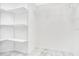 A walk-in closet featuring shelving and a hanging rack, perfect for closet organization at 905 Hatteras Ave, Minneola, FL 34715