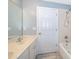 Bathroom featuring a double vanity and a shower/tub combo at 4089 Sw 133Rd Loop, Ocala, FL 34473