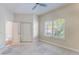 Bedroom featuring a window with shutters and neutral-toned carpet at 10812 Woodchase Cir, Orlando, FL 32836