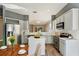 Modern kitchen with stainless steel appliances, ample counter space, and a breakfast nook at 10812 Woodchase Cir, Orlando, FL 32836