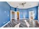 Spacious main bedroom with high ceilings, natural light, and access to a walk-in closet and bath at 10812 Woodchase Cir, Orlando, FL 32836