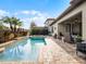 Luxury pool and spa with patio furniture and landscaping at 10875 Savona Way, Orlando, FL 32827