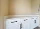 White built-in cabinets with quartz countertop in sunroom at 123 Golf Club Dr, Longwood, FL 32779