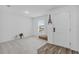 Foyer with wood-look flooring and neutral walls, featuring a small bench at 139 Violet Ct, Kissimmee, FL 34759