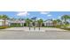 Community clubhouse with welcoming entrance and landscaping at 1401 Lone Feather Trl, Winter Park, FL 32792