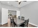 Bright dining room with a view of the living room at 1401 Lone Feather Trl, Winter Park, FL 32792