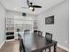 Charming dining room with built-in shelving and a large window at 1401 Lone Feather Trl, Winter Park, FL 32792