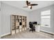 Bright home office features built-in shelving and a workspace at 1401 Lone Feather Trl, Winter Park, FL 32792