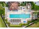 Community pool and amenities from directly above at 14531 Damai Ln, Orlando, FL 32821