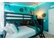 Under the sea themed bedroom with bunk beds and Finding Nemo mural at 14531 Damai Ln, Orlando, FL 32821